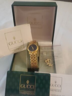 Authentic Gucci Gold-Tone Bracelet Watch / Black Dial With Extra Links
